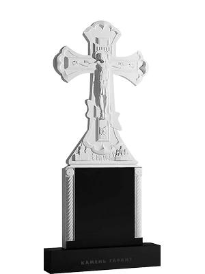 Православный памятник с декоративным резным крестом и орнаментом